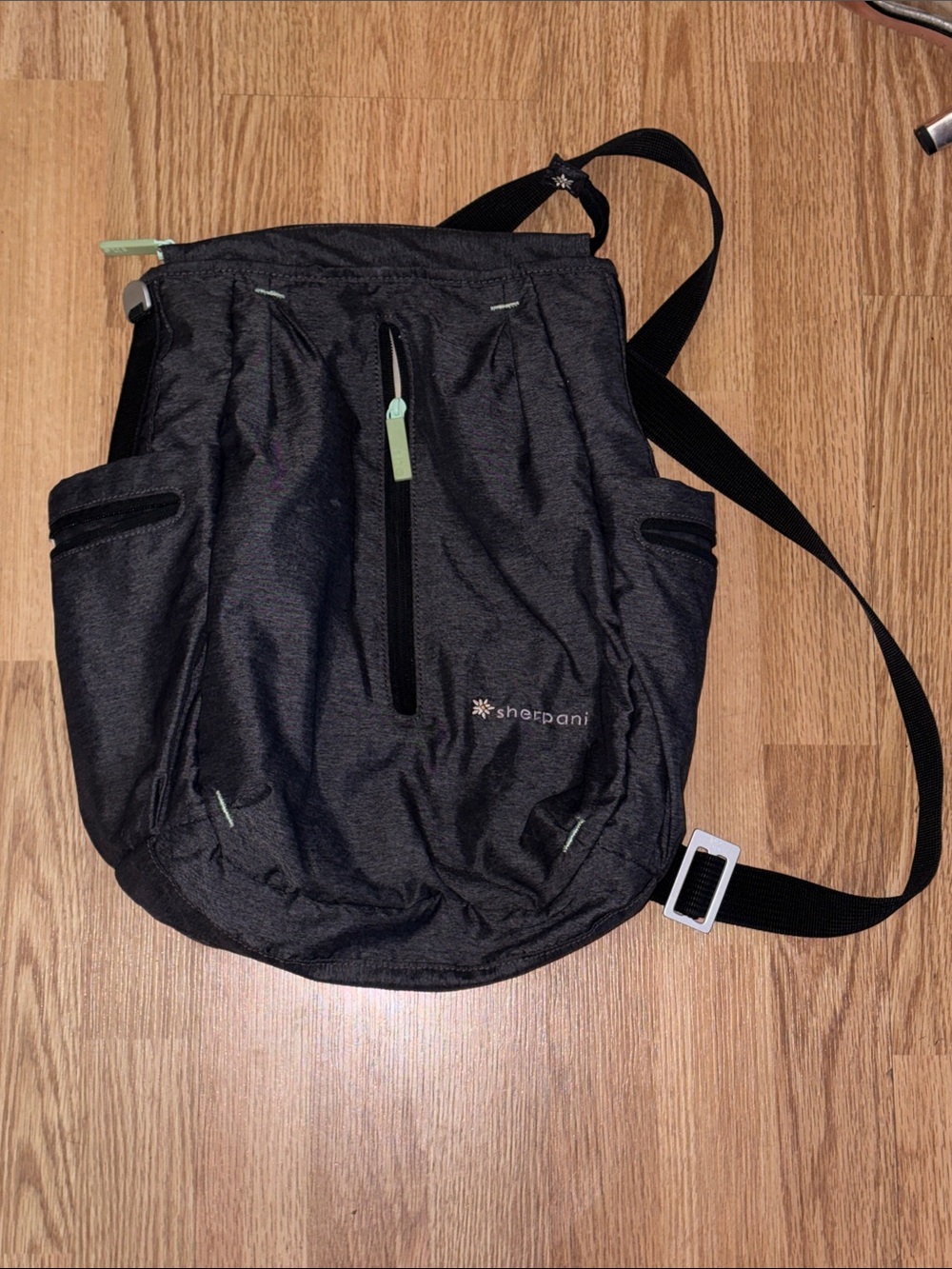 Sherpani Black Sling Crossbody with Mint Accents